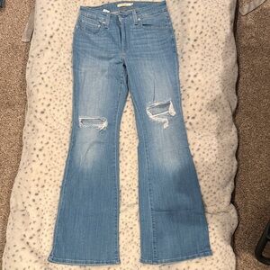 Women's Light Blue Distressed Flare Jeans